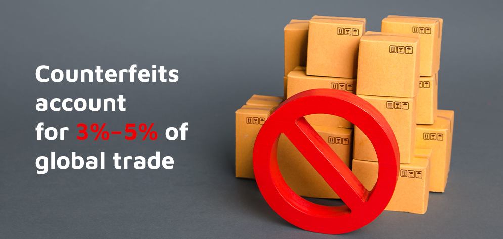 Counterfeit products banned symbol over stacked boxes representing Track and Trace Technology for brand protection