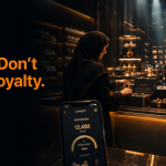 Retail associate arranging exclusive member gift boxes at a luxury loyalty counter showing why loyalty program design matters more than points